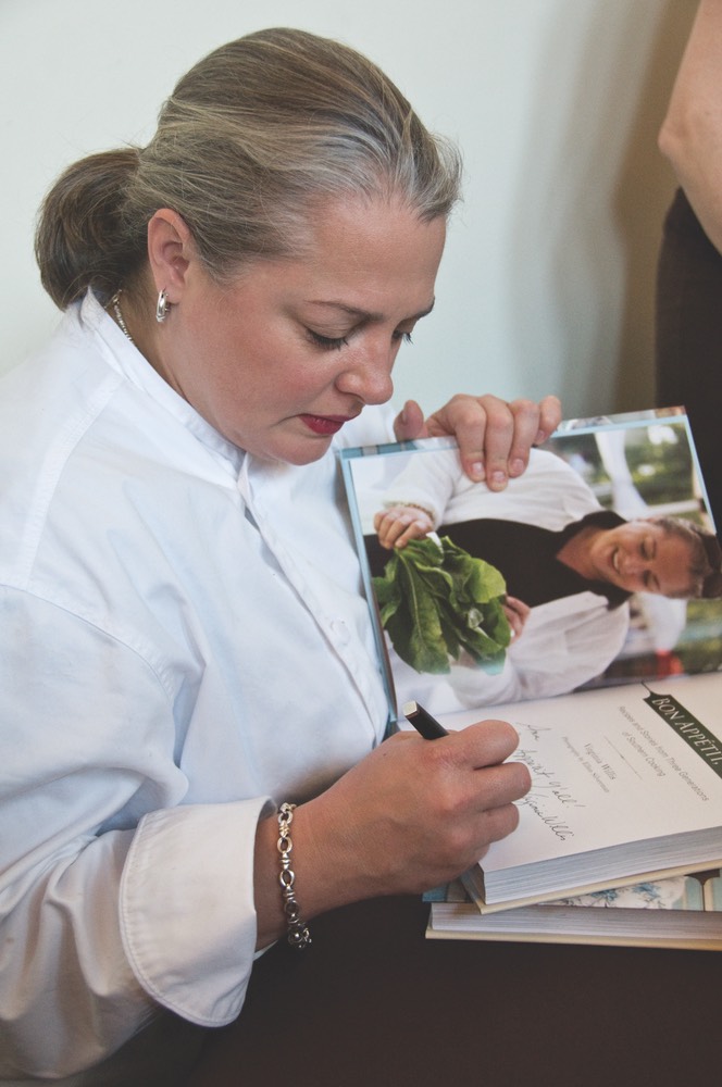 Virginia Willis signing copies of Bon Appétit, Ya'll vie magazine cookbook