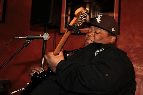 Derwin "Big D" Perkins really gets into the spirit of performing for his band Boukou Groove! 
