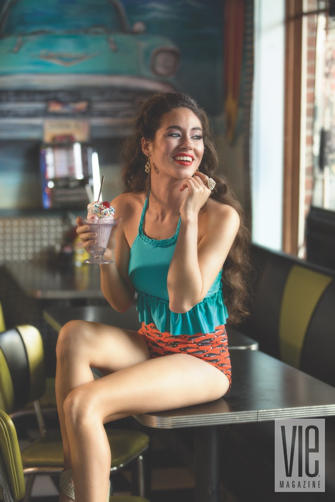 Stunning model Piper Williams enjoying an ice cream sundae in Cayce Collins swimwear