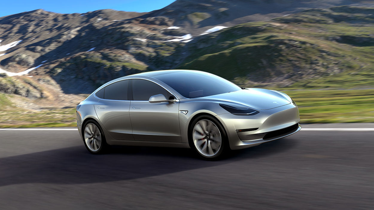 Silver Tesla Model 3 Electric Car Supercharges Through The Scenic Streets