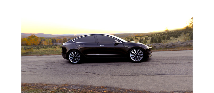 Black Tesla 3 Electric Car Parked On Road