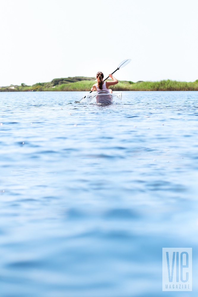 Model in a Klear Kanoo on Western Lake in Grayton Beach State Park