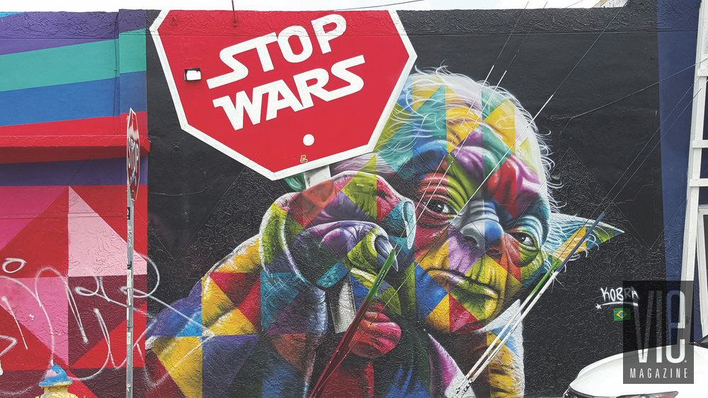 Mural painting on side of wall Wynwood Walls Miami Florida grafitti street art yoda star wars stop wars