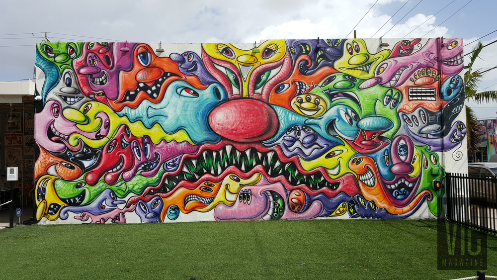 Mural painting on side of wall Wynwood Walls Miami Florida grafitti street art colorful abstract
