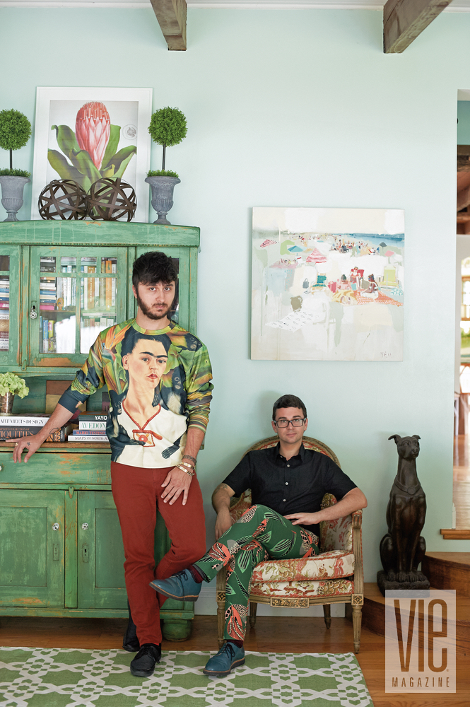 Christian Siriano and Brad Walsh posing in front of paint by Charleston artist Teil Duncan Connecticut Home Bed Bath and Beyond floral print design interior