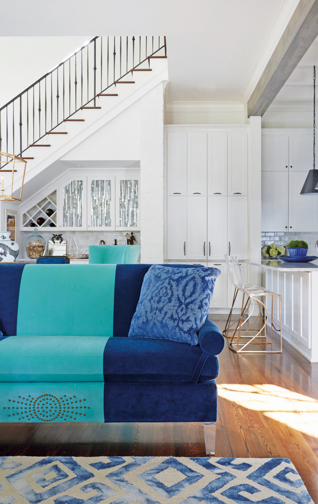 Susan Lovelace Destin home interior design blue striped couch staircase