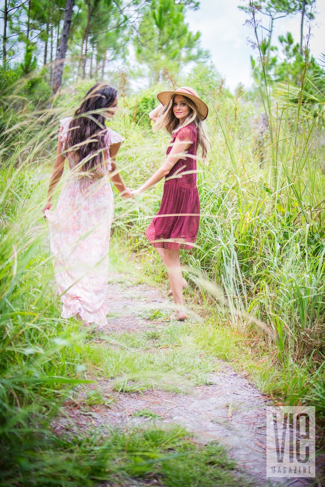 Models walking down a trail Fancy Camps VIE magazine glamping
