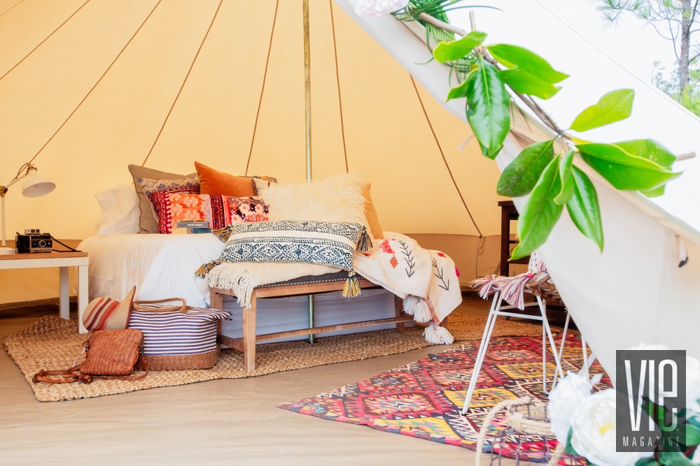 Interior shot of a Fancy Camps tent luxurious camping glamping outdoors pillows