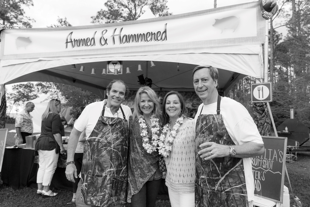 Steve and Lynn Dugas with Valerie and Mike “Chi Chi Miguel” Thompson at the 2016 Throwdown Benefit Auction and Barbecue. Photo by Steven Freeman.