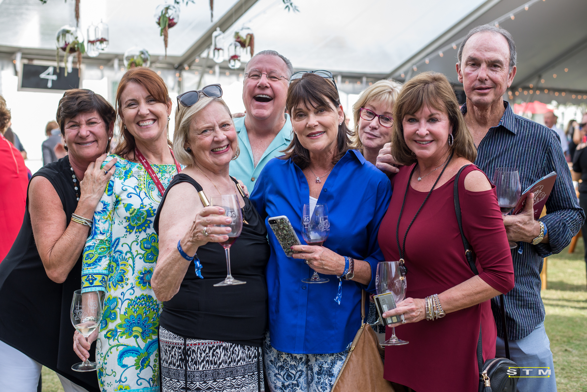 Patrons at Silent Auction DCWAF wine festival event Seaside FL