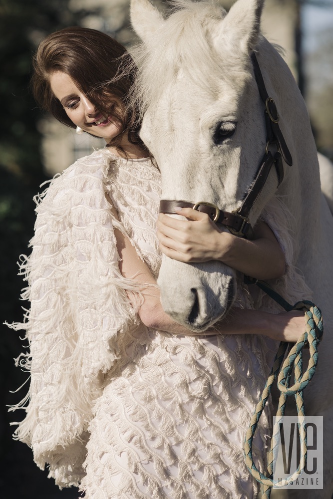 Faye Dinsmore and her white horse at Ballynahinch Castle The Sophisticate Issue 2016