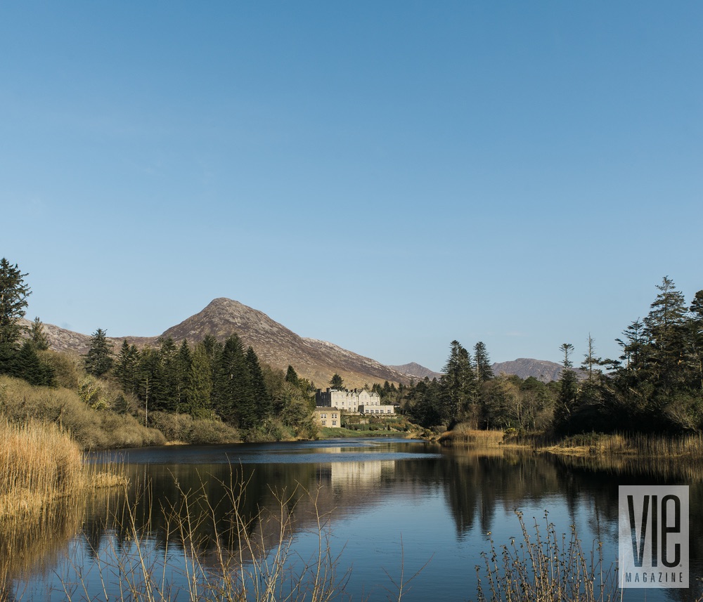 Landscape shot of Ballynahinch Castle in Ireland blue skies reflection The Sophisticate Issue 2016