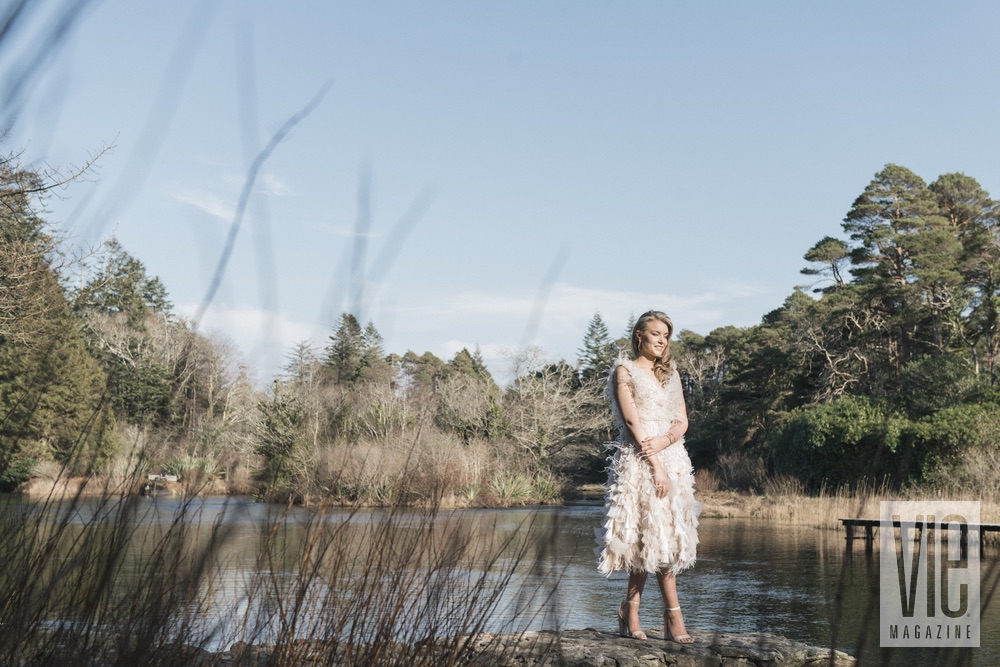 Irish model wearing Christian Siriano by the water at Ballynahinch Castle