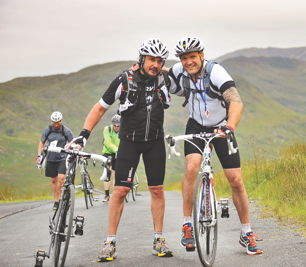 Two men biking in the hills and mountains in Western Ireland