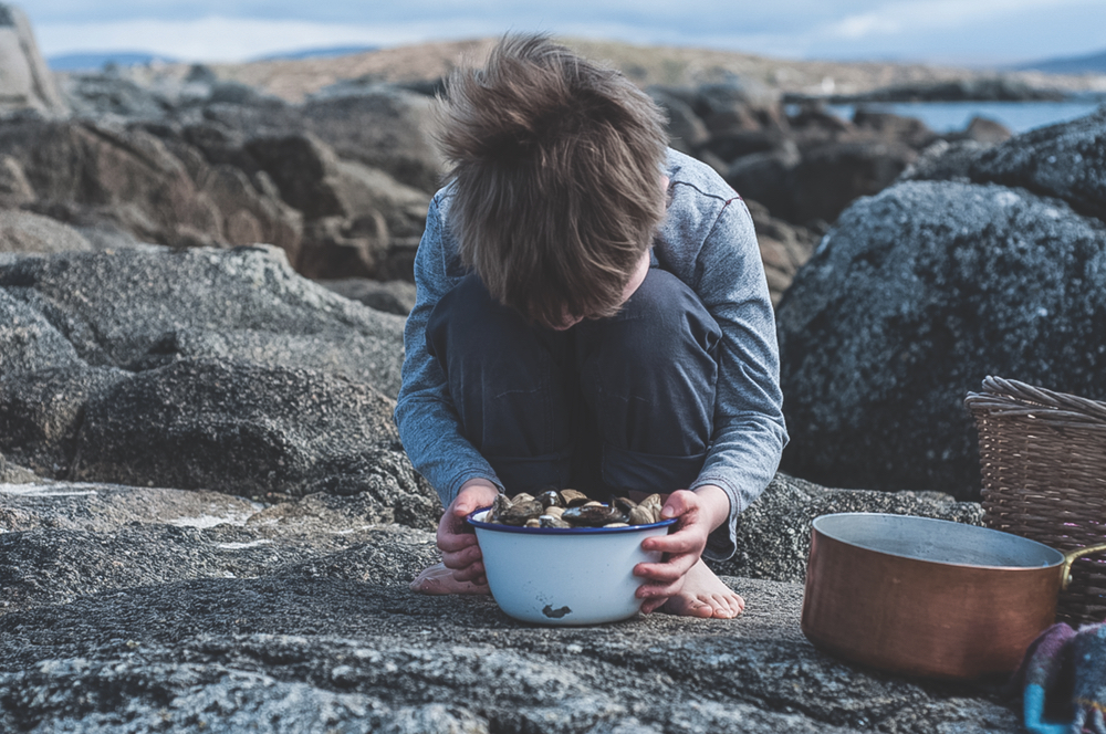 Cliodhna's son helping her cook Western Ireland Breaking Eggs Connemara Life