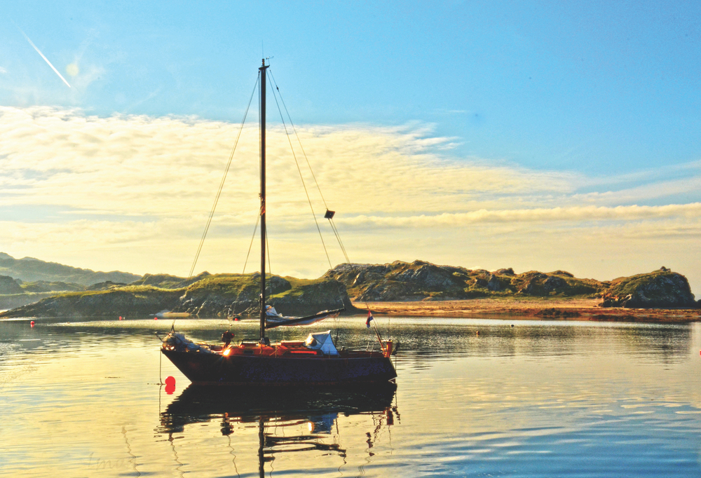 The serenity of a safe harbor reflects the island’s beauty in Inishbofin Ireland