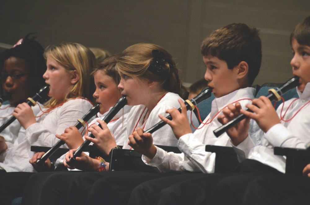 Kids learning clarinets at the Sinfonia Education Program