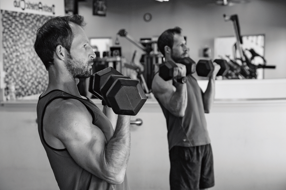 Zoltan “Zoli” Nagy lifting weights at Destin Athletic Club