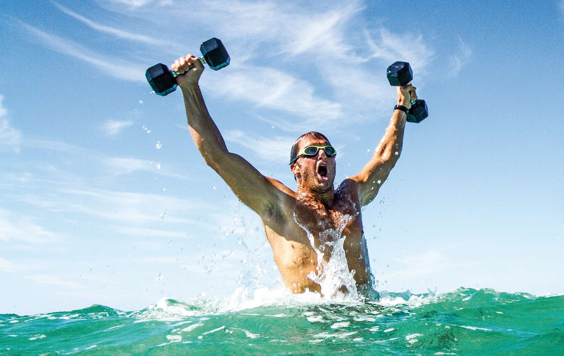 Vitality Pro man coming out of the water with weights exercise healthy living