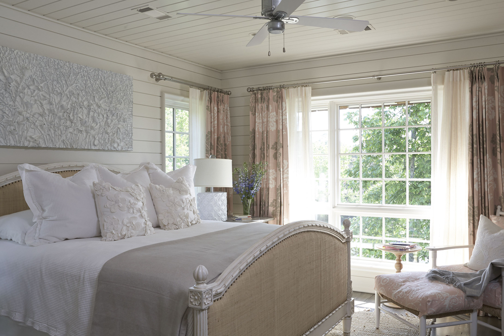 Bedroom with large window in Lake Martin Home Culinary and Couture 2017
