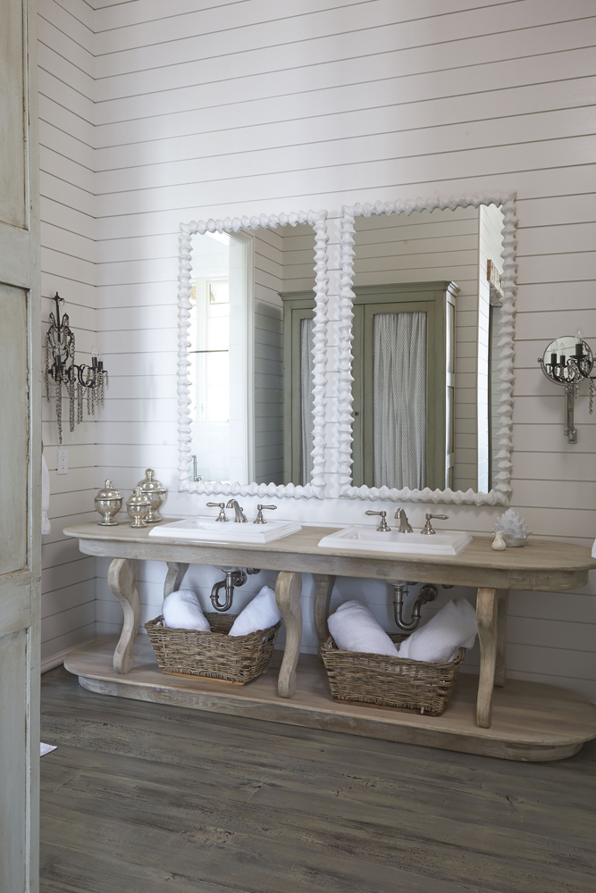 Detail shot of the double sinks and mirrors Lake Martin home bathroom