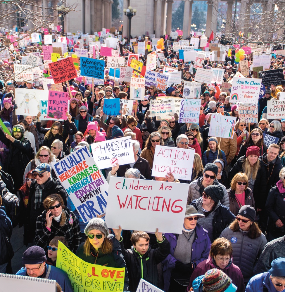 More than a hundred thousand protestors march in downtown Denver in the Women’s March on January 21, 2017, one day after President Trump’s inauguration. Photo by Andrew Repp/Shutterstock.