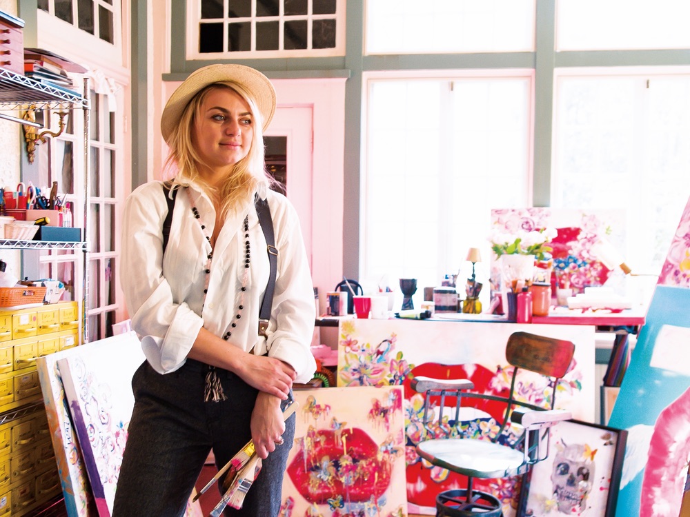 Artist Olesya Ianovitch poses in her New Orleans studio. Photo by Scott Simon.