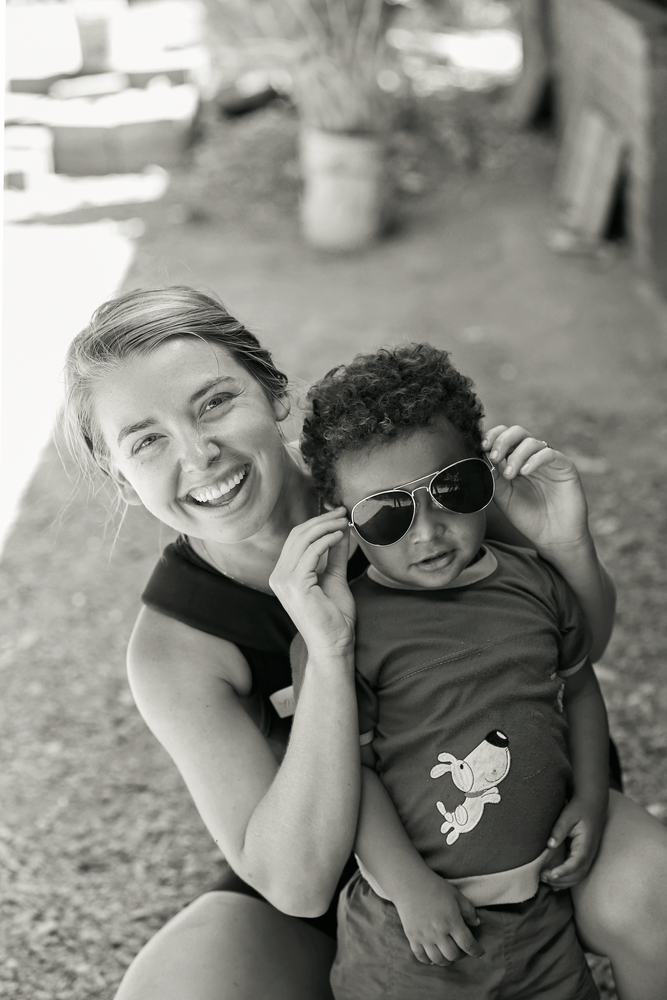 Author Meghan Ryan playing with a child in Nicaragua Filter of Hope clean water