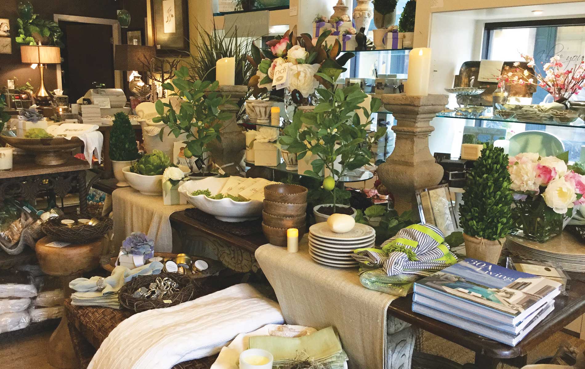 Magnolia House Lifestyle Store, located in the Grand Boulevard Town Centre in Miramar Beach, Florida, offers home decor, books, original artwork, and much more.