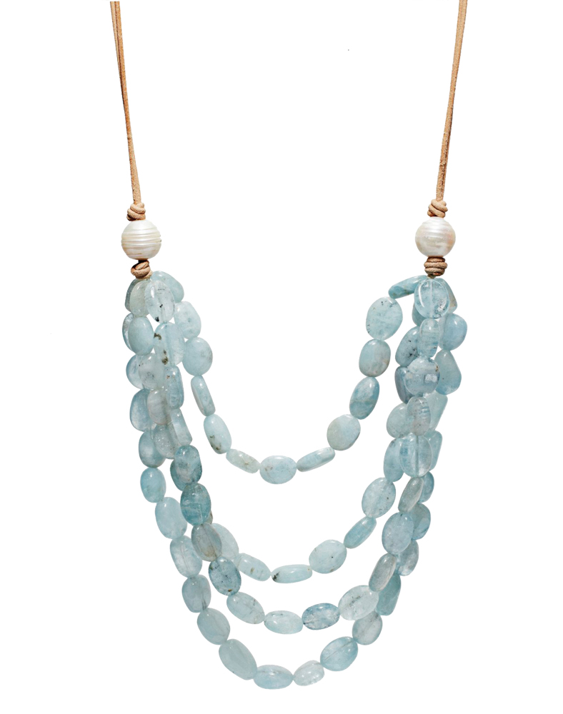 Twenty-inch necklace with four layers of hand-selected aquamarine stones on silk and natural leather with pearl clasp.