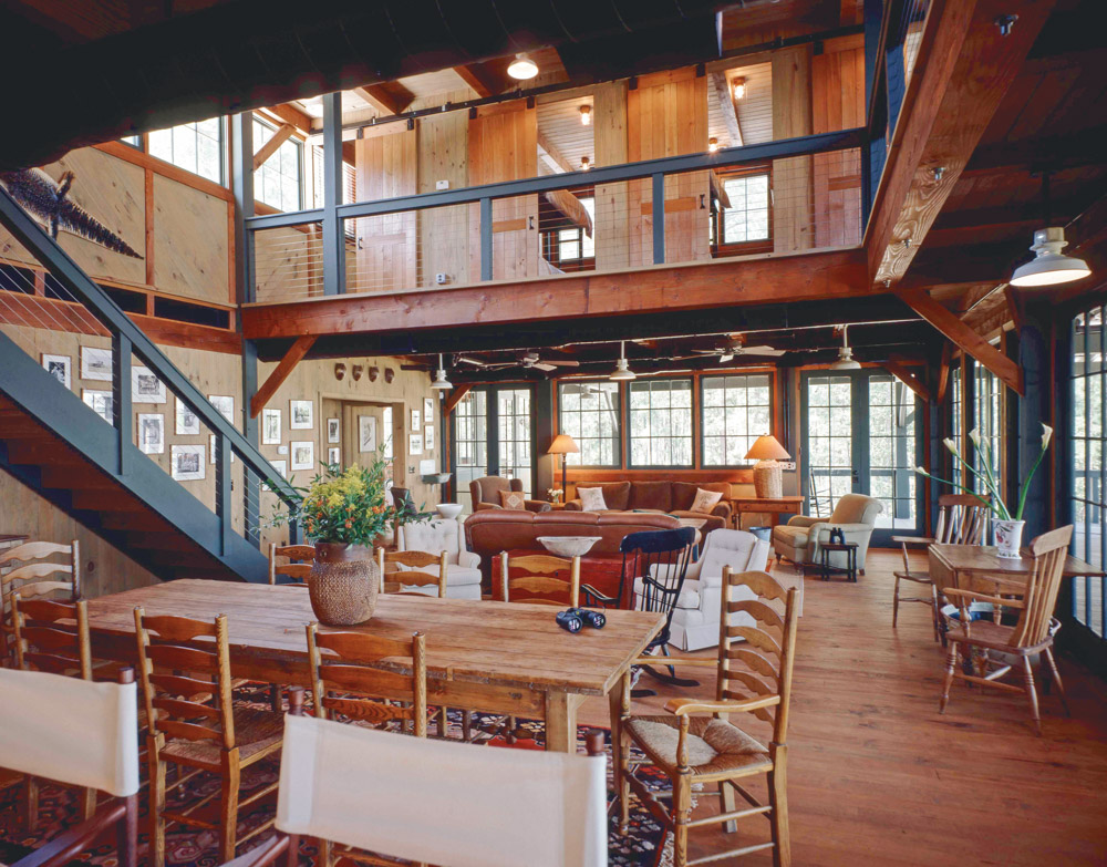 True timber-frame construction and the sturdy simplicity of post-and-beam carpentry are evident in the Oyster House, the island’s riverfront sporting lodge. Photo by Richard Leo Johnson