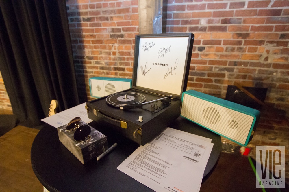Live auction item, a Crosley Snap Turntable, signed by all our performers at VIE Magazine's "Stories with Heart and Soul" tour at The Listening Room Cafe to benefit Alaqua Animal Refuge