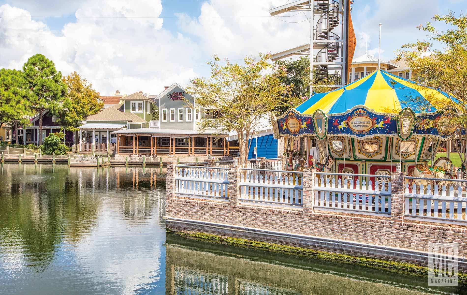 Carousel at The Village of Baytowne Wharf Blue skies fun games family experience