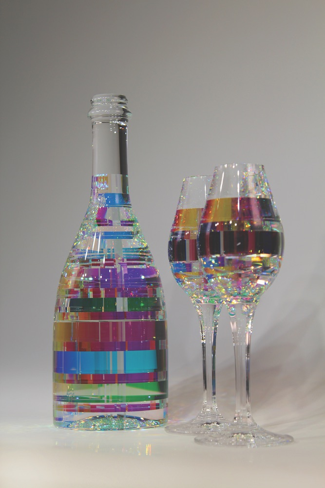 The Bella collection includes sculpted glass decanters, wine glass, Jack Storms, champagne flutes, martini glasses, and more, VIE Magazine, The Artist Issue