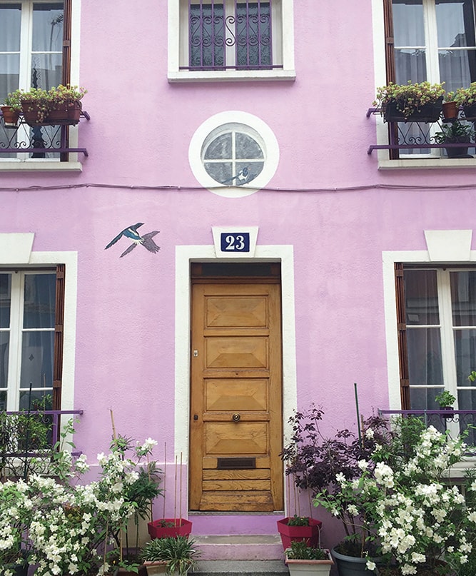 Doorways of Paris photographed by Rachel Puig pink building Parisian architecture