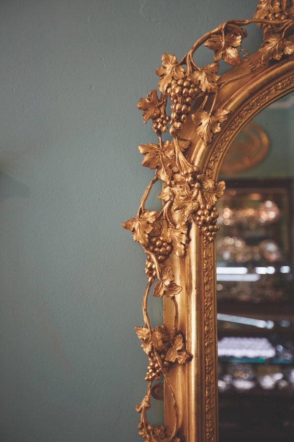 Ornate details on a mirror at John Farrington Antiques. VIE Magazine. The Sophisticate Issue