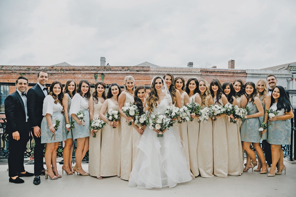 The wedding party, featuring beautiful custom dresses designed by the bride's label Jolie and Elizabeth