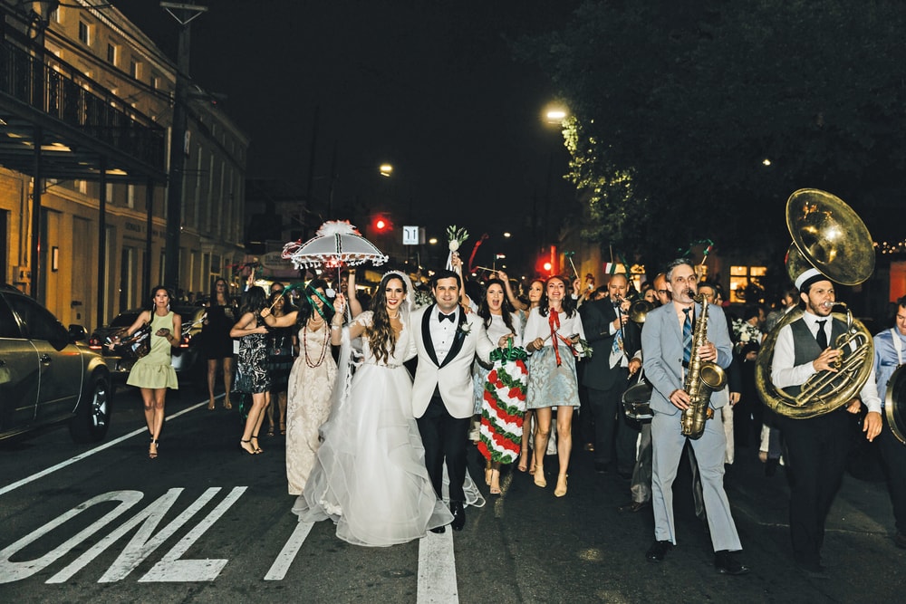 Parade line followed by the newlyweds from St. Mary's Assumption Catholic Church to Il Mercato