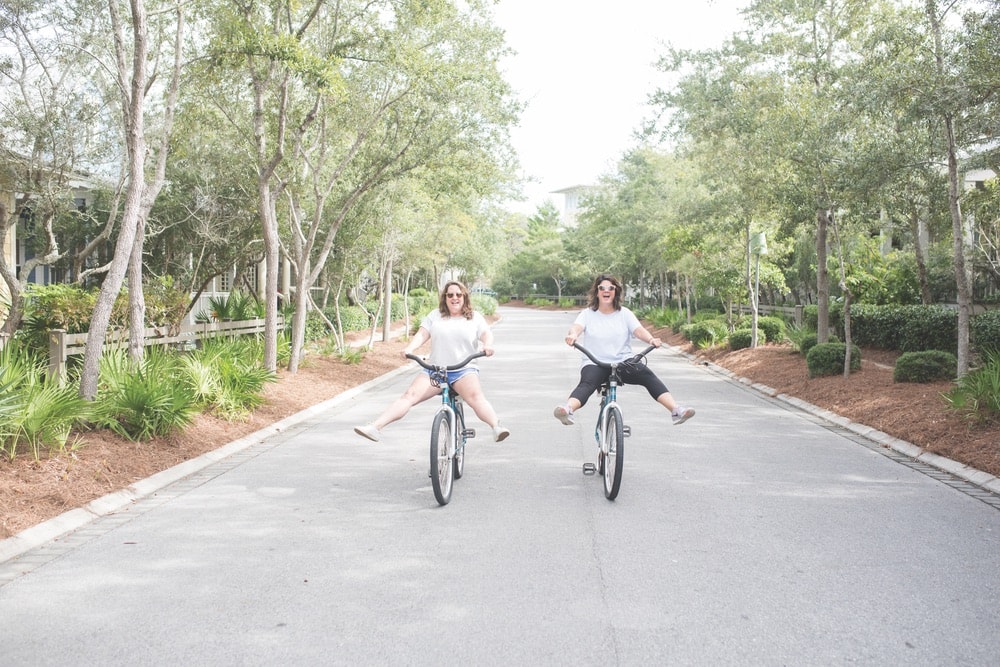 The Southern C founders Cheri Leavy and Whitney Long riding bikes in WaterColor