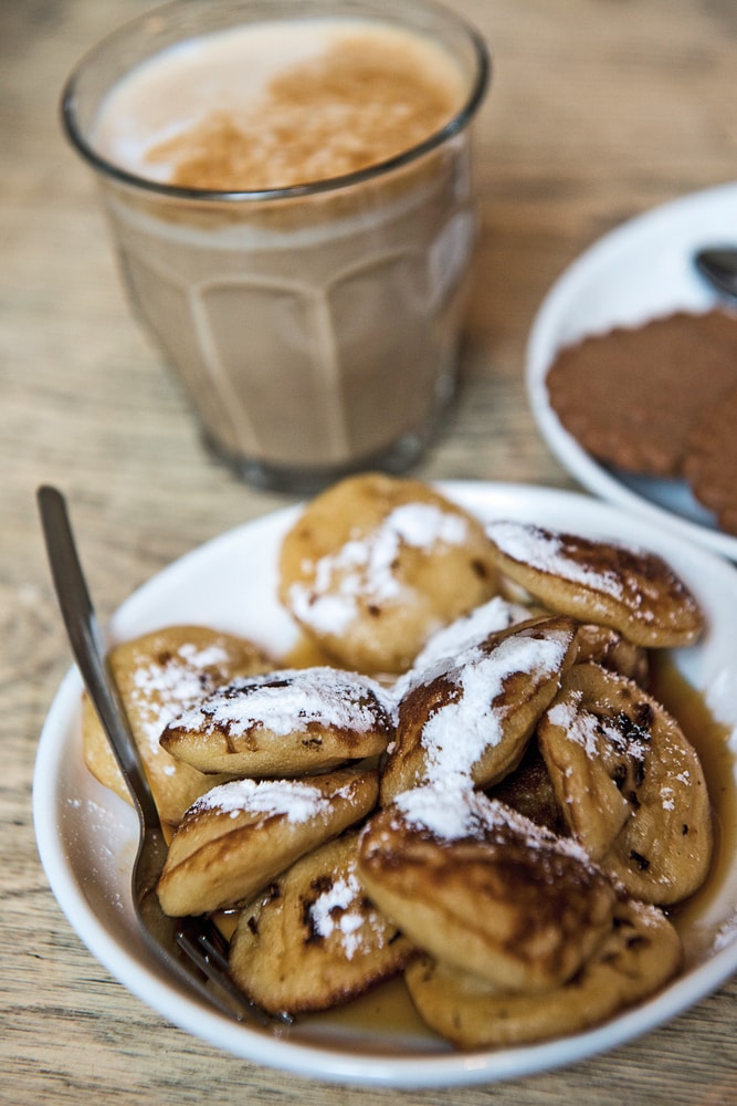 sugary mini pancakes called poffertjes are served at breakfast in Amsterdam