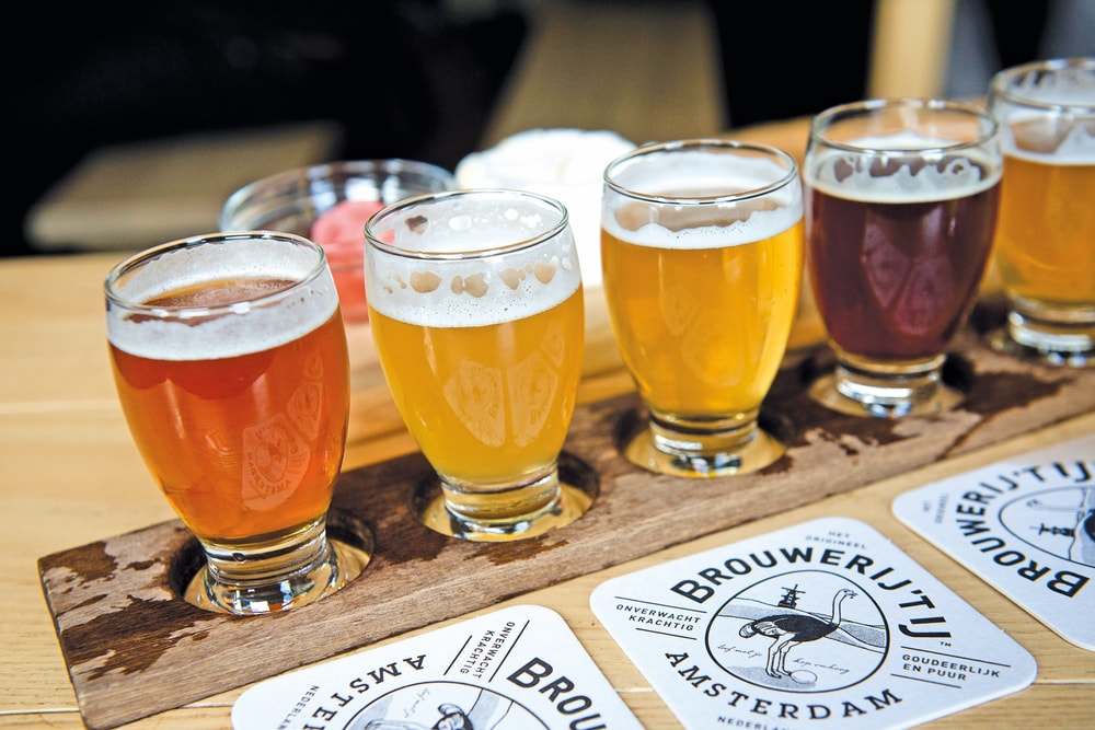 Brouwerij ’t IJ offers a flight of four organic beers in Amsterdam