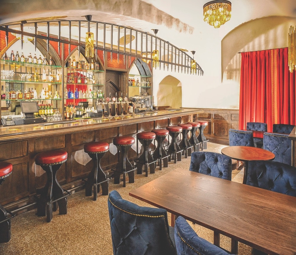 Guests can enjoy a drink with medieval flair at the castle’s pub.