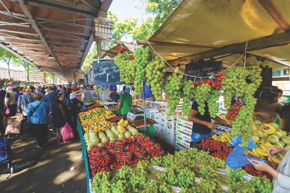 Sumptuous fruits and other fresh produce at an open-air market in Paris Photo by Sorbis / Shutterstock