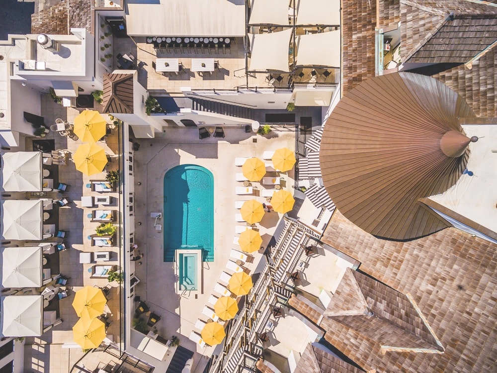 Aerial view of The Pearl Hotel's pool and rooftop lounge in Rosemary Beach, Florida