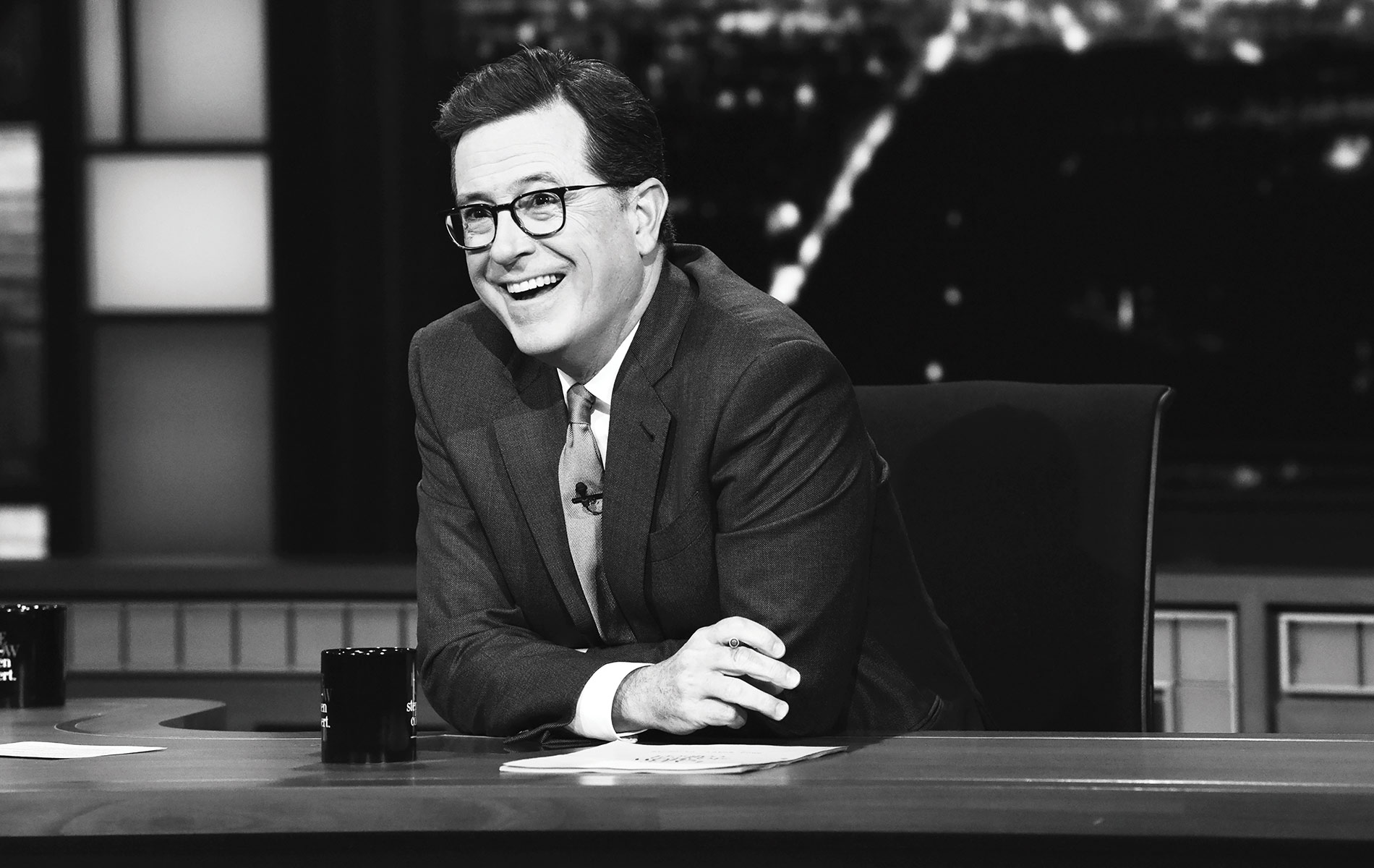 Stephen Colbert sitting on set for The Late Night Show with Stephen Colbert. VIE Magazine - The Entertainer Issue March 2018