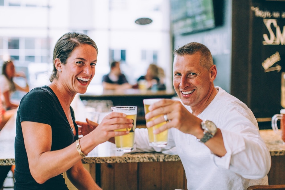 Couple enjoying a beer at D9 Brewing Company in Charlotte, North Carolina