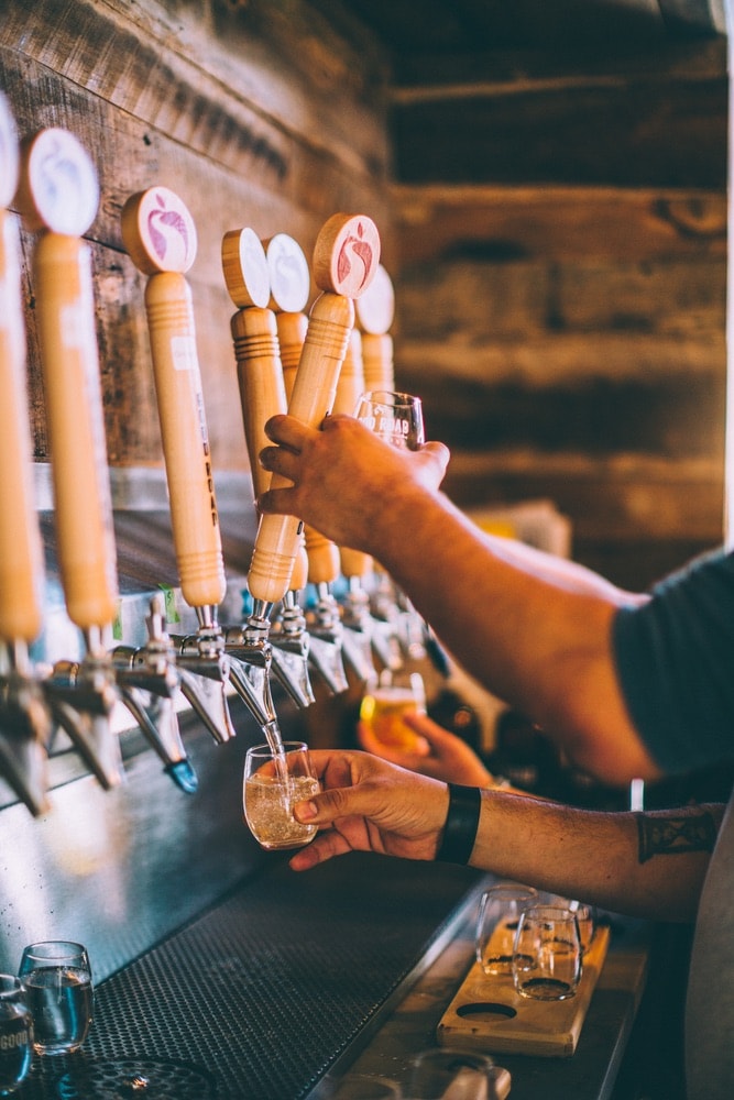 Beer being poured at GoodRoad CiderWorks in Charlotte, North Carolina