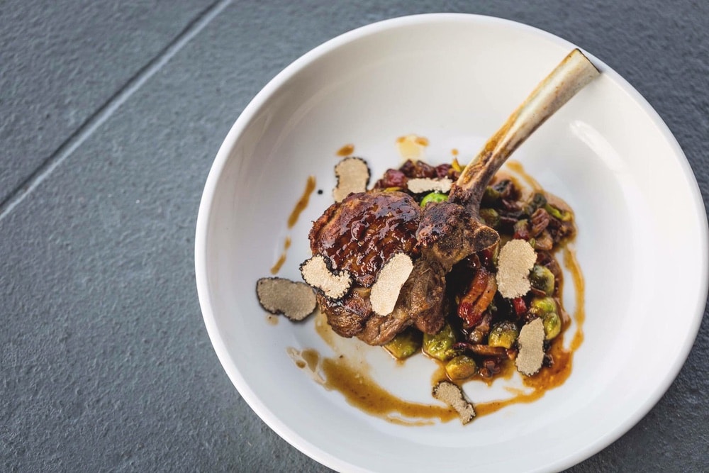 Grilled Milk-Fed Veal Chop with Roasted Brussels Sprouts and Pancetta by Chef Derek Langford from Firefly in Panama City Beach, Florida