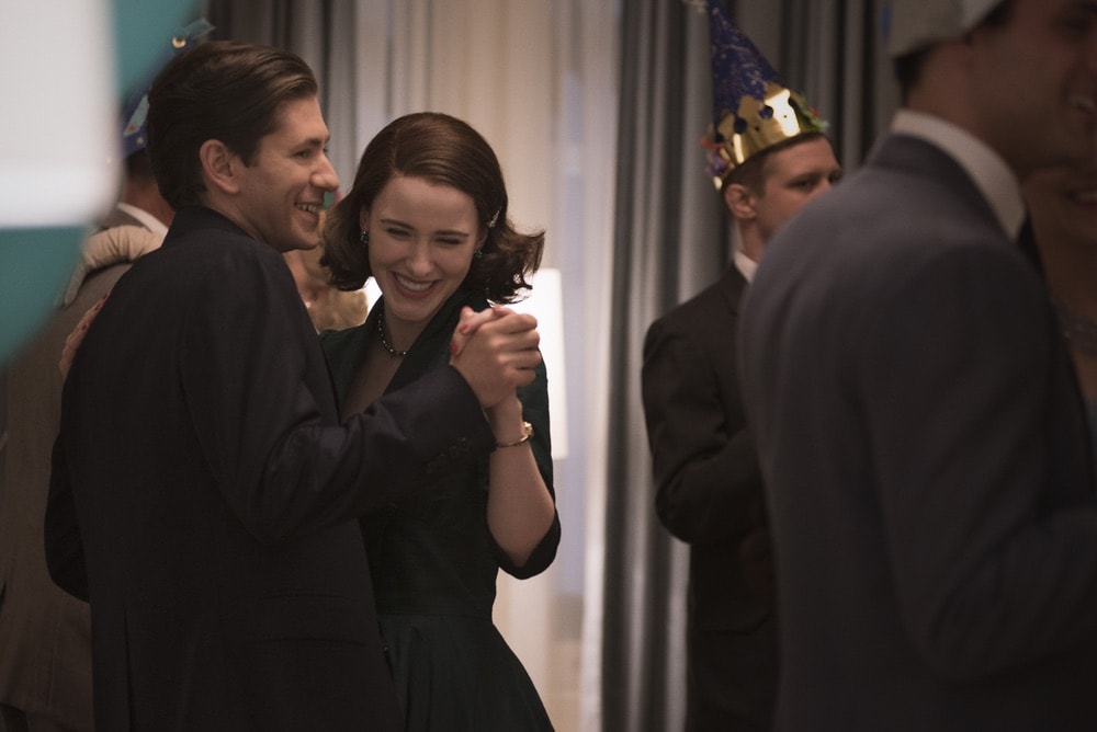 Rachel Brosnahan and Michael Zegen in Season 1 of The Marvelous Mrs. Maisel dancing at a party.