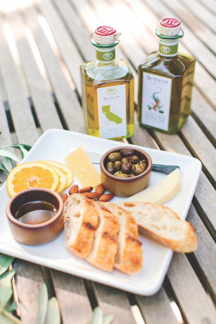 The McEvoy Ranch offers a seated tasting flight of three wines, seasonal bites, and their award-winning olive oil.